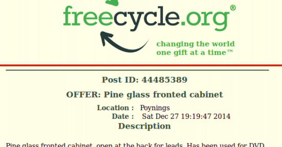 Pine glass fronted cabinet in Poynings