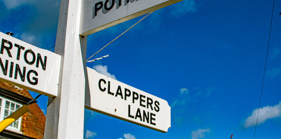 Signpost showing Clappers Lane sign